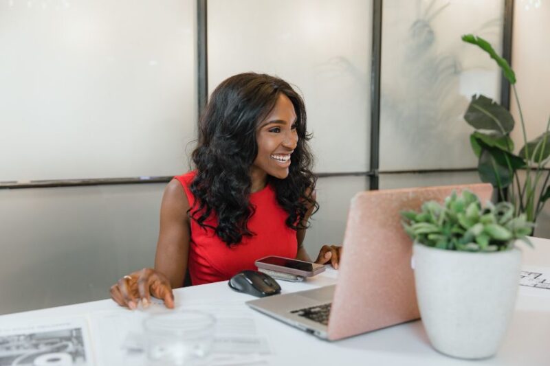 Woman starting a business in Nigeria with her laptop