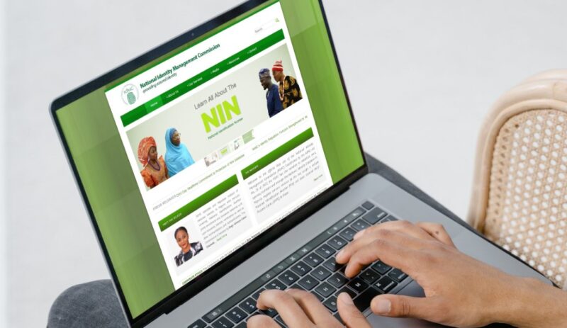 A person is browsing NIMC portal