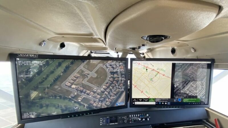 Interior View of An Aircraft Cockpit Showing Two Mantis Computer Screens Displaying Maps and Navigation Data