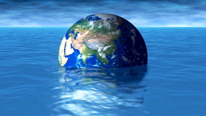 Planet Earth appears half-submerged in rising water, symbolizing the real effects of climate change kids need to learn about