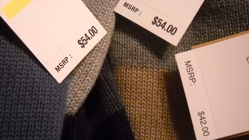 Price tags on products showing different values, illustrating disciplined pricing strategy
