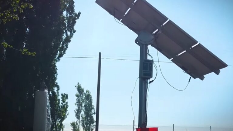 AI-powered solar pump system with a mounted solar panel powering off-grid water pumping
